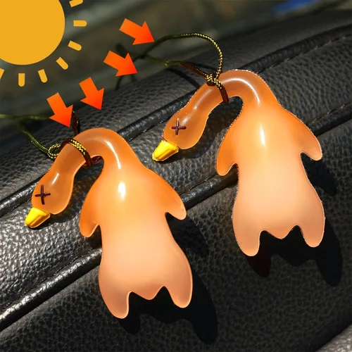 Colgante de pato asado que cambia de Color para coche, accesorios divertidos sensibles a la luz UV, pegamento suave, decoración colgante, decoración Interior de coche