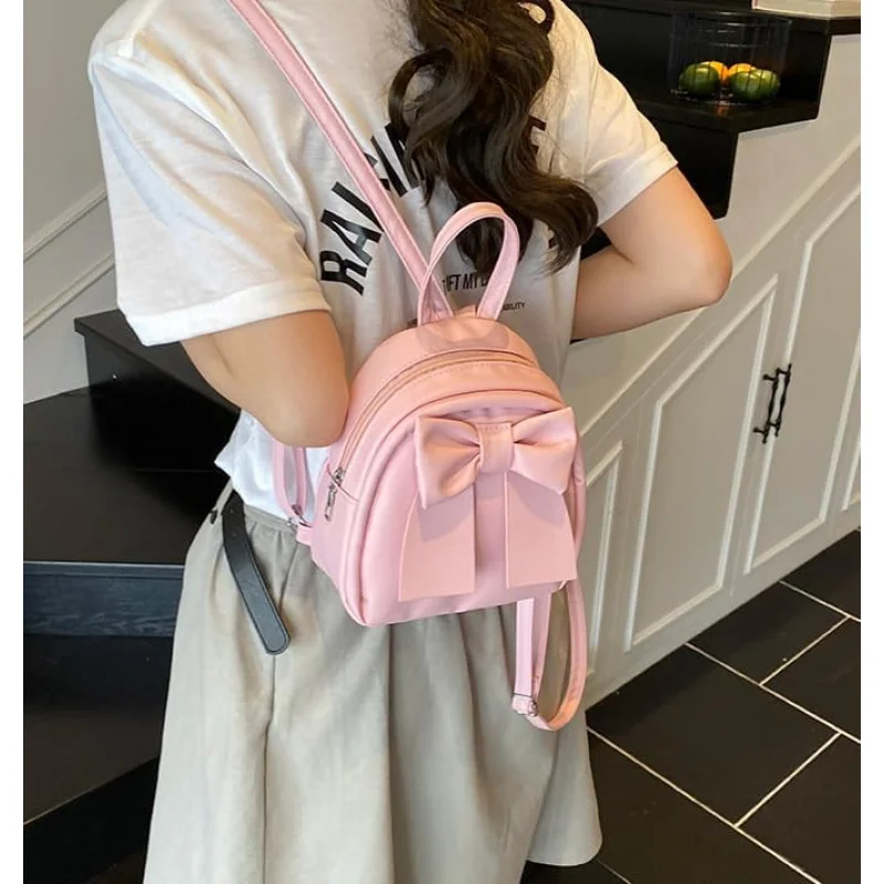 귀여운 리본 백팩 여성 패션 소형 숄더백 심플한 디자인 캐주얼 다용도 여행 팩(핑크)