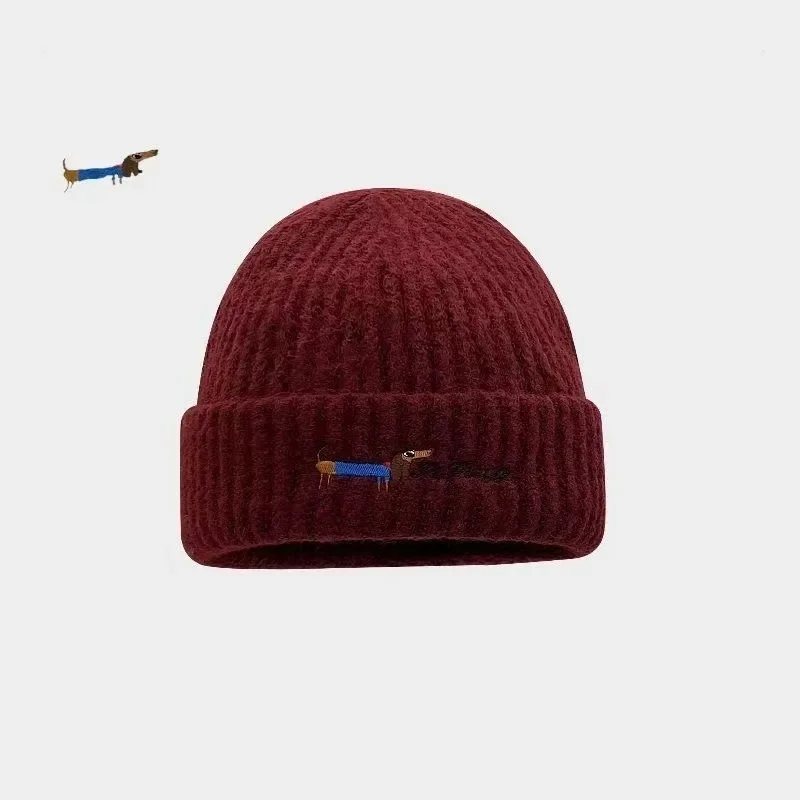 Gorro de lana cálido de punto bordado con cachorros ins auténticos para mujer, gorro fresco versátil para invierno con protección para los oídos para estudiantes
