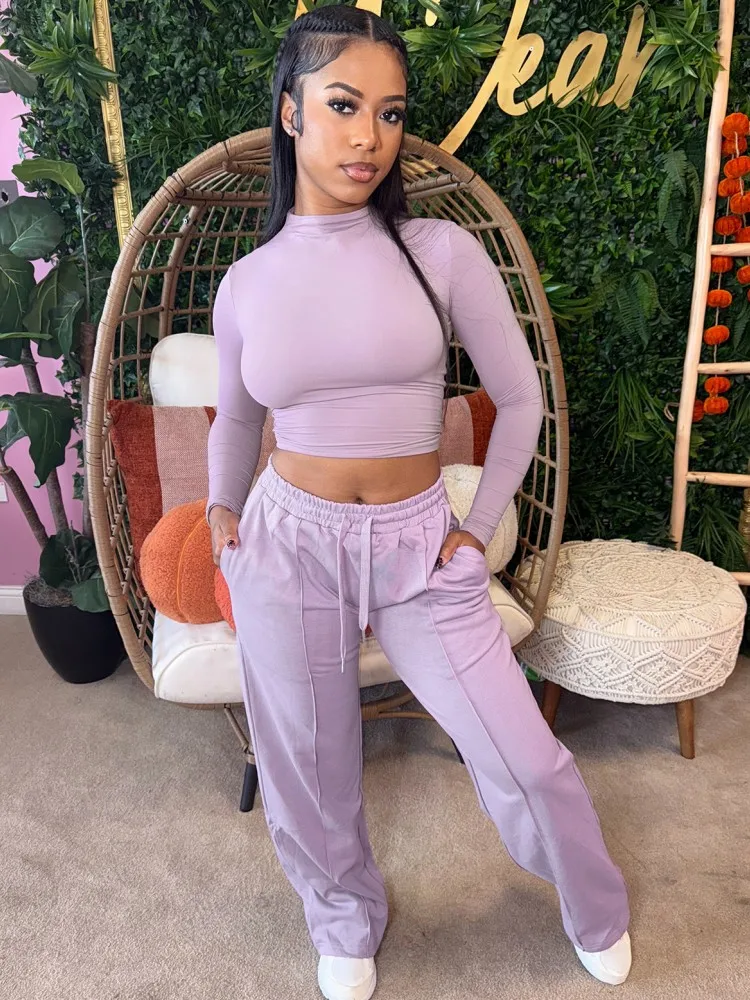 Set da donna da 2 pezzi 2026 Nuovo arrivo Primavera Autunno Set coordinati Manica lunga Tinta unita Top e pantaloni Abiti Abiti Abbigliamento