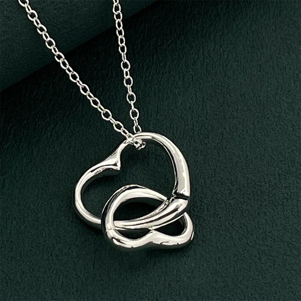 

Ожерелье с подвеской в форме сердца из стерлингового серебра 925 пробы. Стильный и простой универсальный аксессуар для женщин, идеально подходит для повседневного использования.