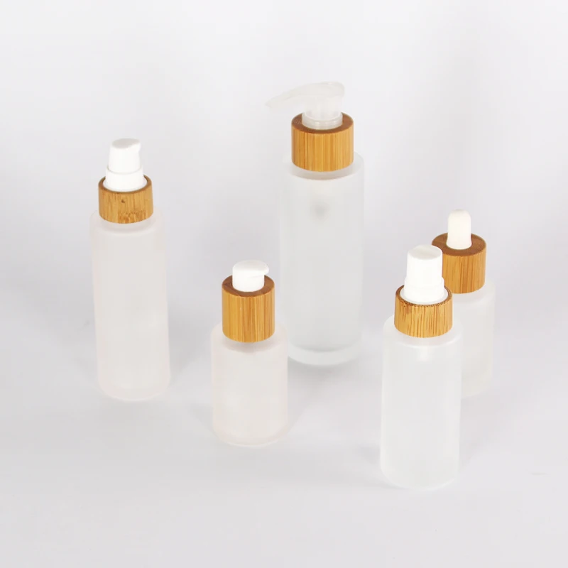 

Frosted glass cosmetic bamboo cap bottle with spray glass pump bottles for cosmetics 20ml 30ml 40ml 50ml 60ml 80ml 100ml 120ml