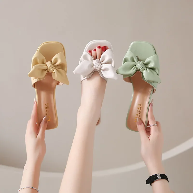 

2025 летние женские модные однотонные сандалии на плоской подошве с бантом, уличные пляжные тапочки, удобные