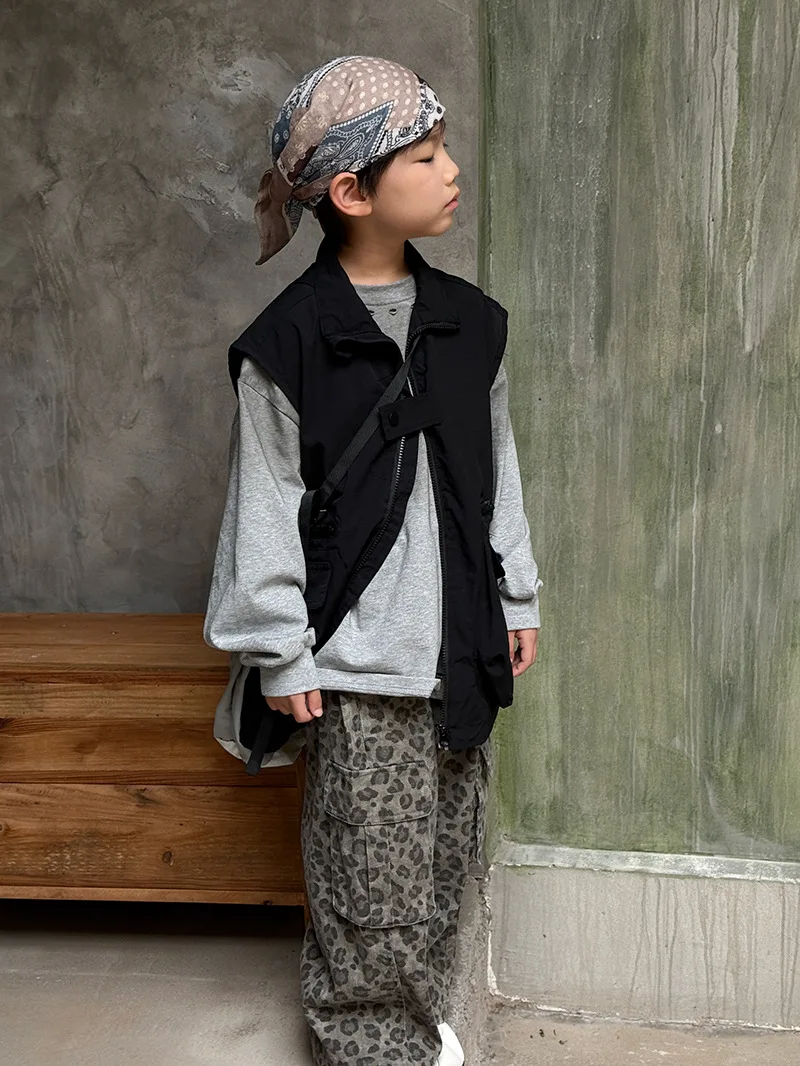 سترة شحن كلاسيكية للأطفال لخريف 2025 موضة كورية جديدة غير رسمية يومية بلون سادة بدون أكمام معطف بياقة واقفة #5