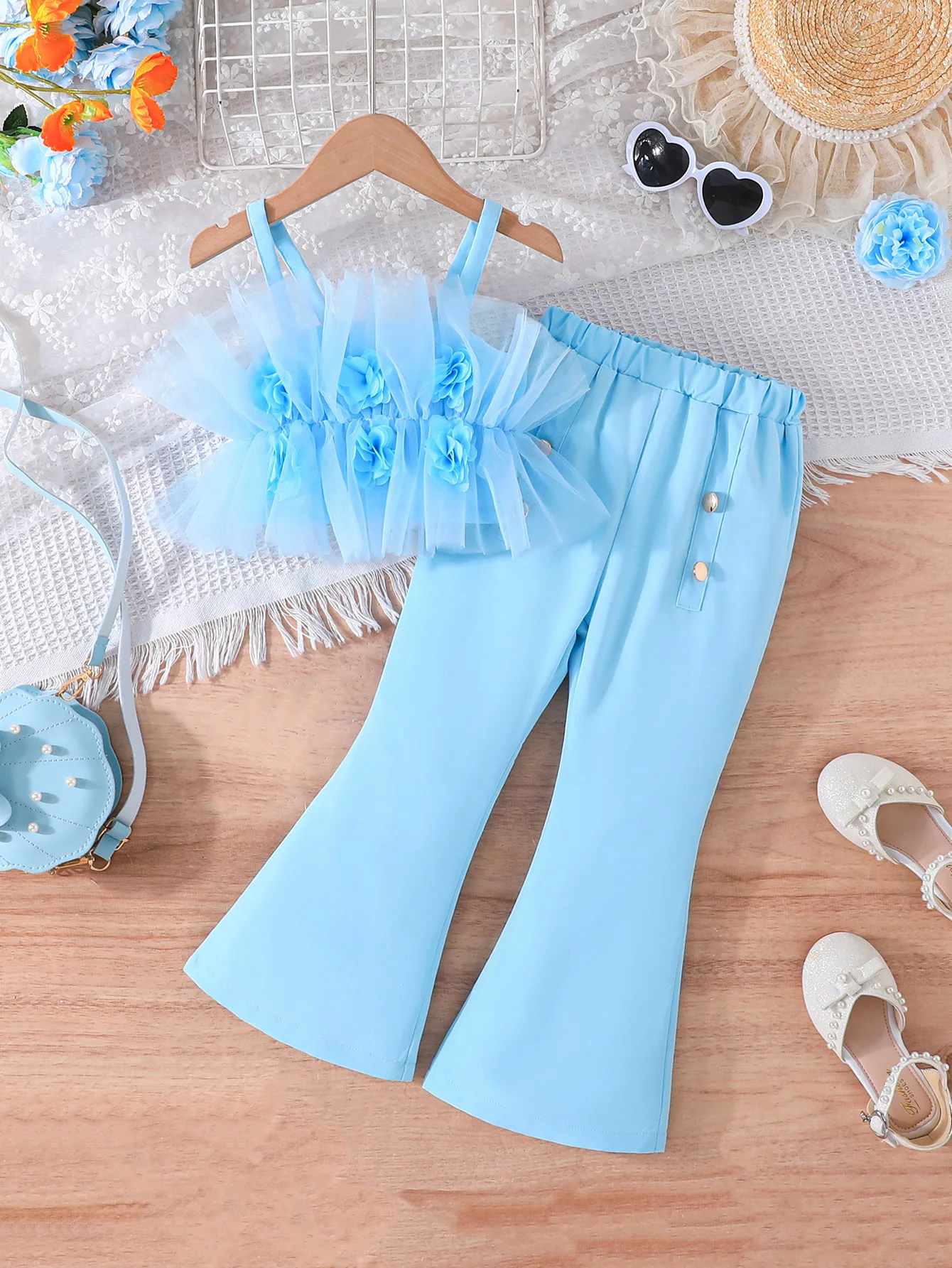 

2024 Summer Child Clothes Sets Sleeveless Ruffles Flowers Tops Blue Flare Pants 2 Piece Sets Designer Girls Clothes Sets 8-12T