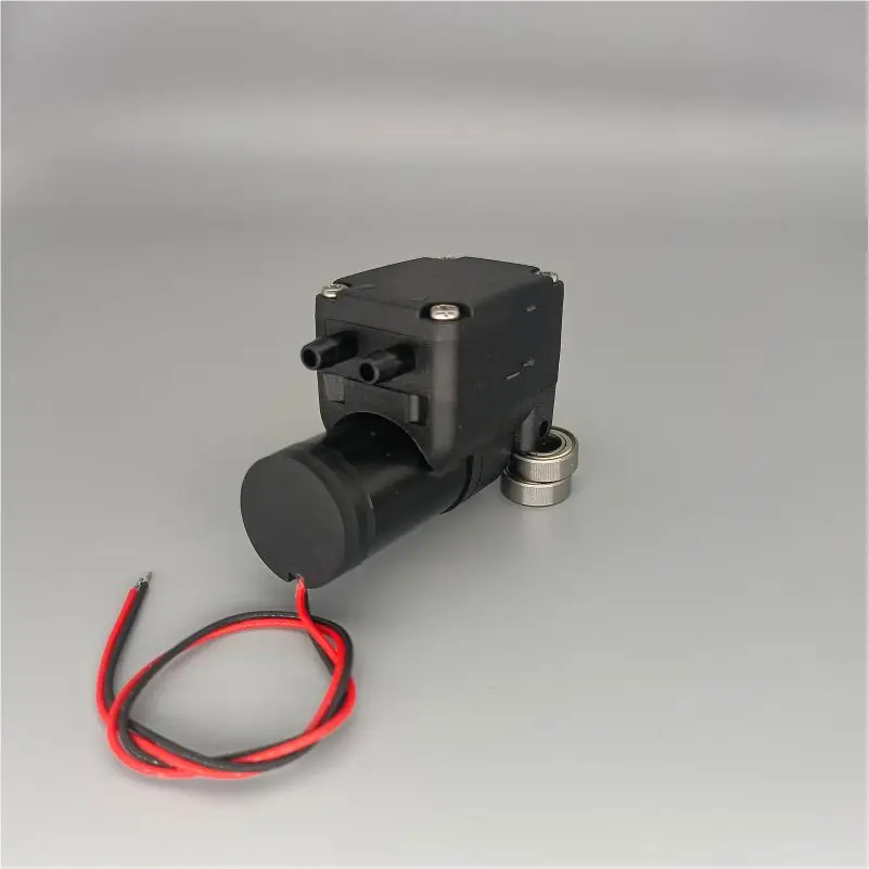 Miniature Vacuum Pu… - image