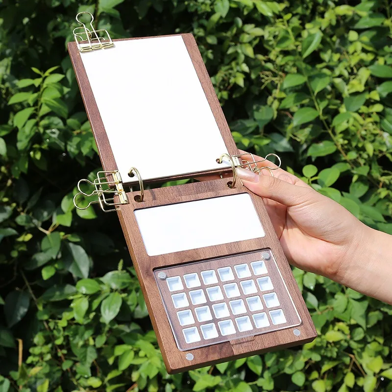 

Набор для путешествий из 24 ячеек: портативный акварельный набор со сменными листами, прочный футляр, маленькая художественная доска, художественные принадлежности, палитра для эскизов и рисования