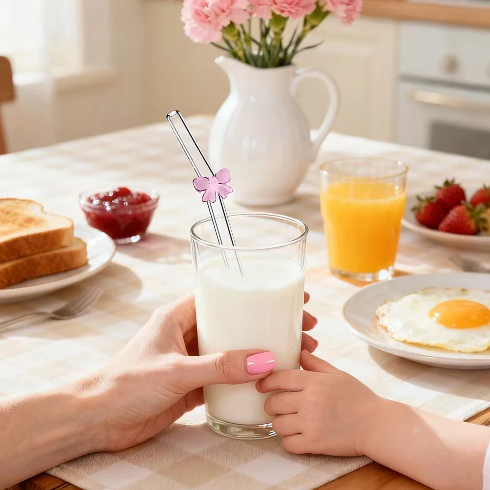 مجموعة قش زجاجية شفافة مكونة من 6 قطع، مقاومة للكسر مع لمسات فيونكة وردية ساحرة، قابلة لإعادة الاستخدام للعصائر والحليب والشاي والي