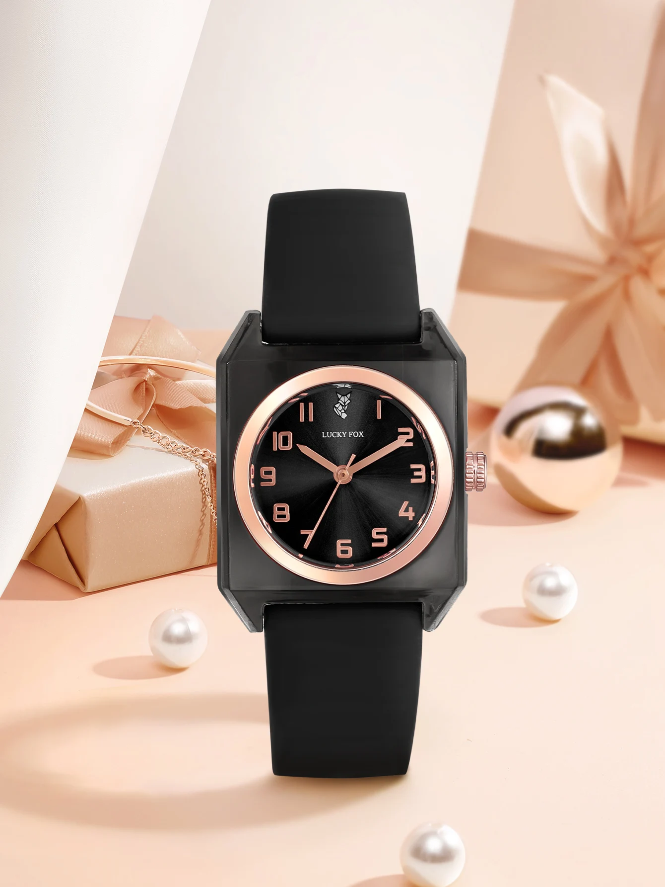 Fashionable women's quartz watch with small square green face and Arabic numerals; suitable for any occasion.