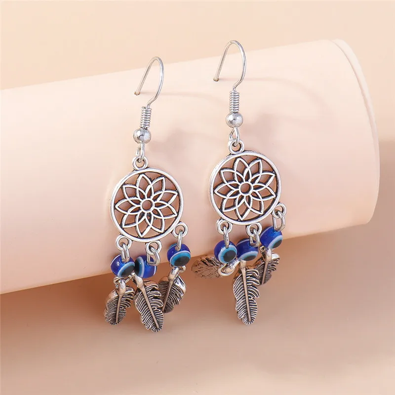 

Gothic Hollow Dream Catcher Earrings Simple Retro Turkish Lucky Blue Eye Feather Leaf Witch Pagan Earrings for Women Jewelry