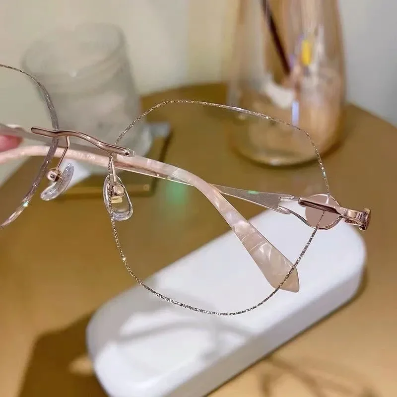 Occhiali da lettura senza cornice tagliati in metallo occhiali da presbiopia squisiti ed eleganti Anti luce blu da donna + 1.0 a + 4.0