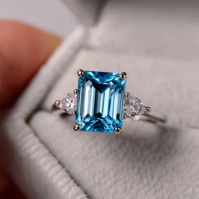 

SGARIT Jewelry Blue Crystal Ring for Women 925 Sterling Silver Emerald Cut Topaz Ring for Christmas Gifts