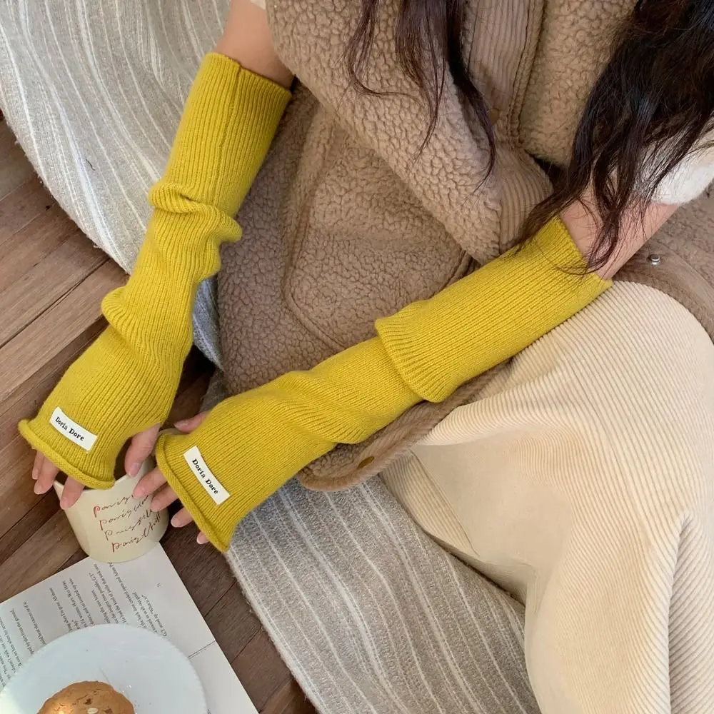 Maniche calde lavorate a maglia stile coreano tinta unita Y2k maniche lunghe senza dita guanti da braccio in lana con foro piccante per ragazza primavera