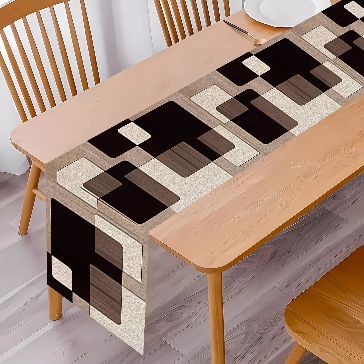 Camino de mesa cuadrado geométrico minimalista elaborado con tonos marrones, ideal para decoración moderna de comedor en el hogar, creando una vibración sofisticada