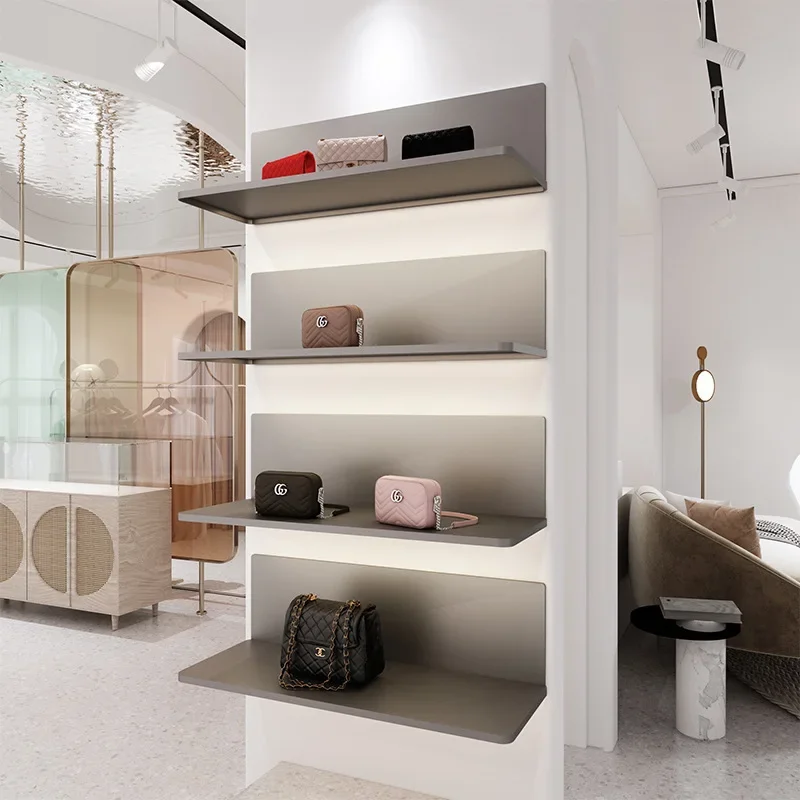 Clothing store display rack on the wall Women's clothing Shoes and bags accessories Stainless steel shelves Hats