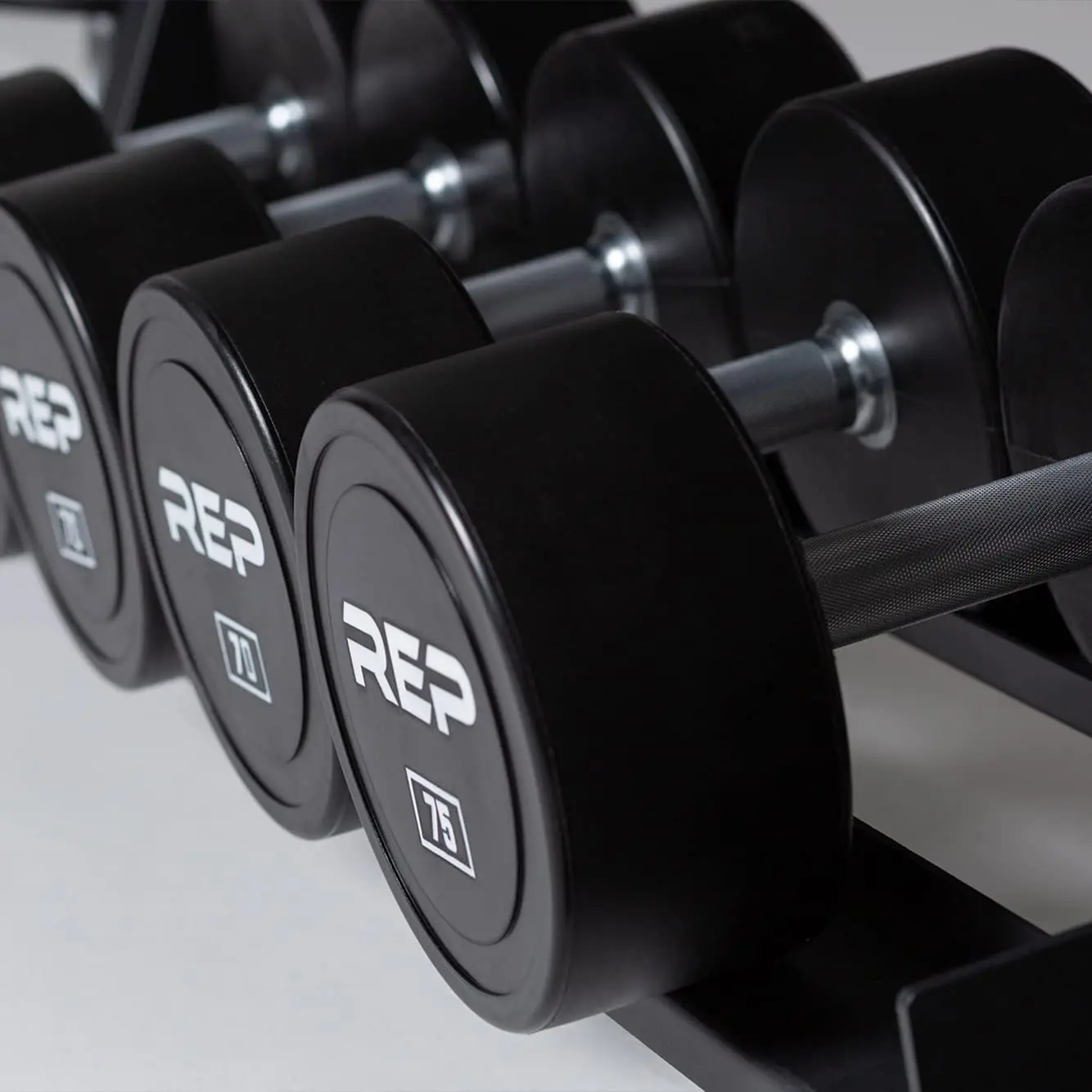 Fitness Urethane Coated Round Dumbbells, 5 to 100 lbs, Singles or Pairs, With or Without Rack, Steel Core, Rubber, Customized