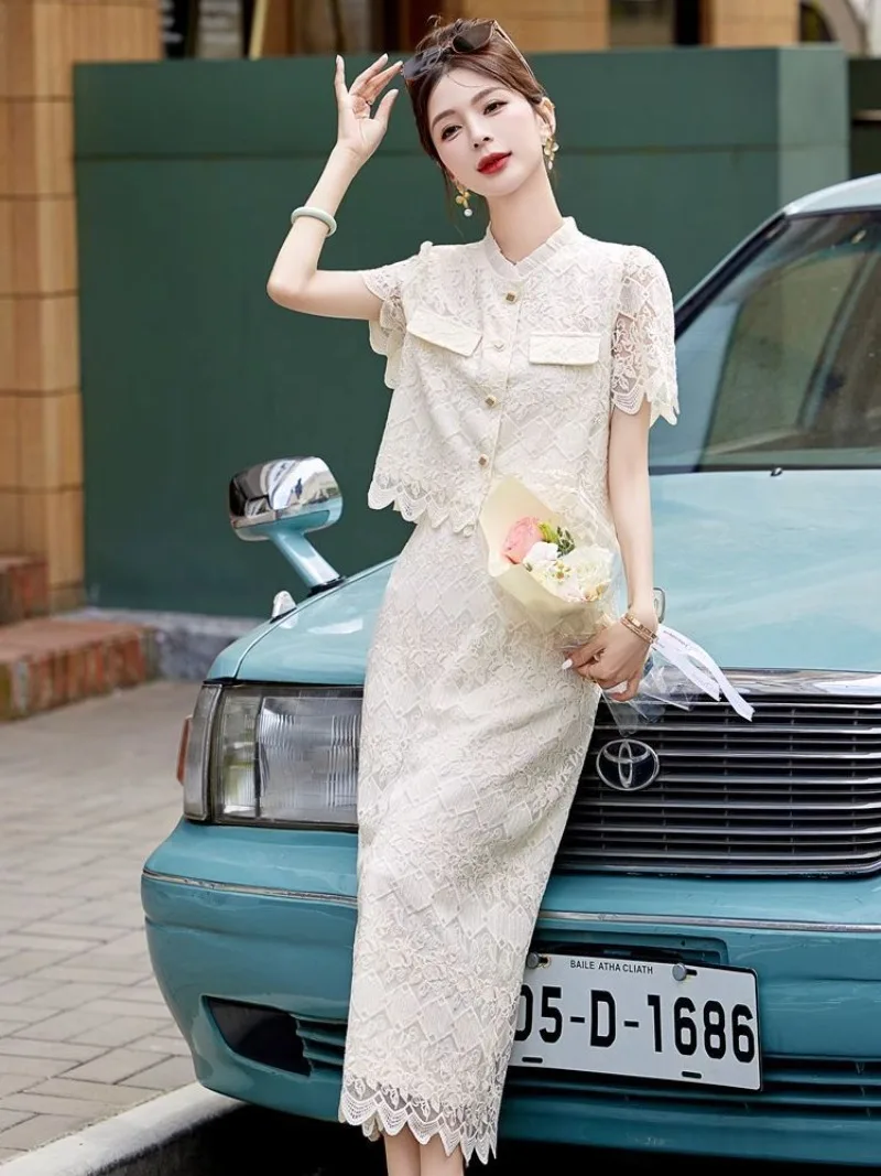 

New High Quality French Summer Women's Suit Fashion Lace Hollow Out Short Sleeve Shirt Top + High Waist Split Skirt 2 Piece Set