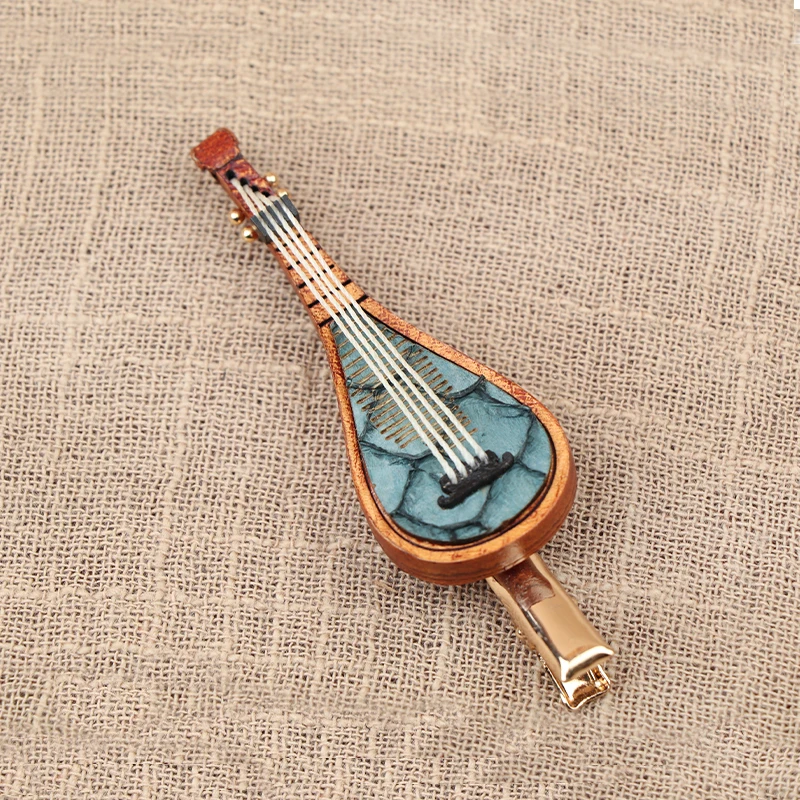 

Genuine leather hair clip for women featuring a unique design inspired by pipa and violin exquisite retro style side clip bangs
