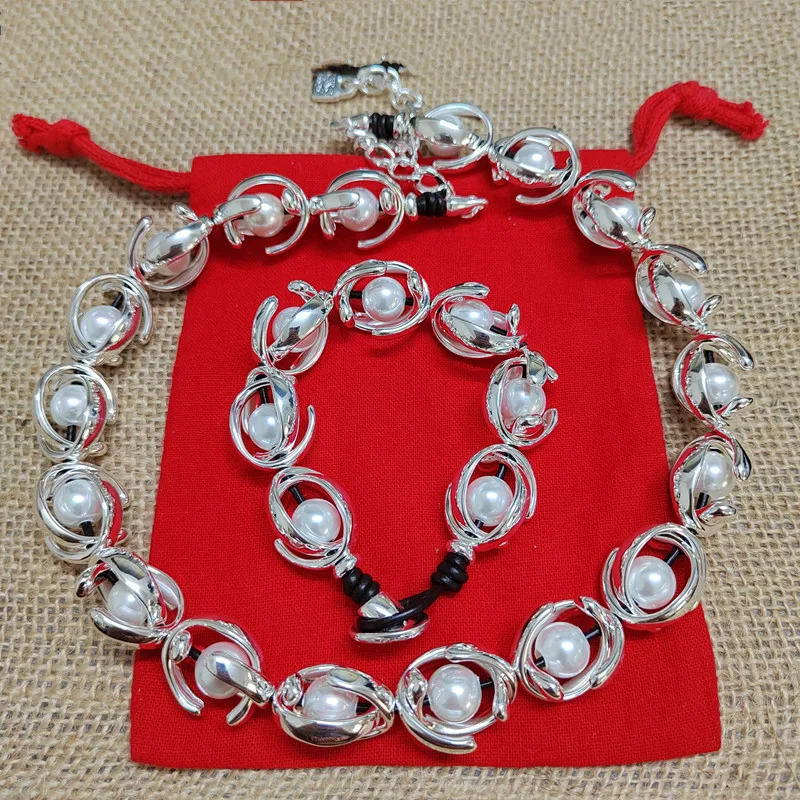

Spanish niche design stainless steel crescent-shaped pearl women's necklace