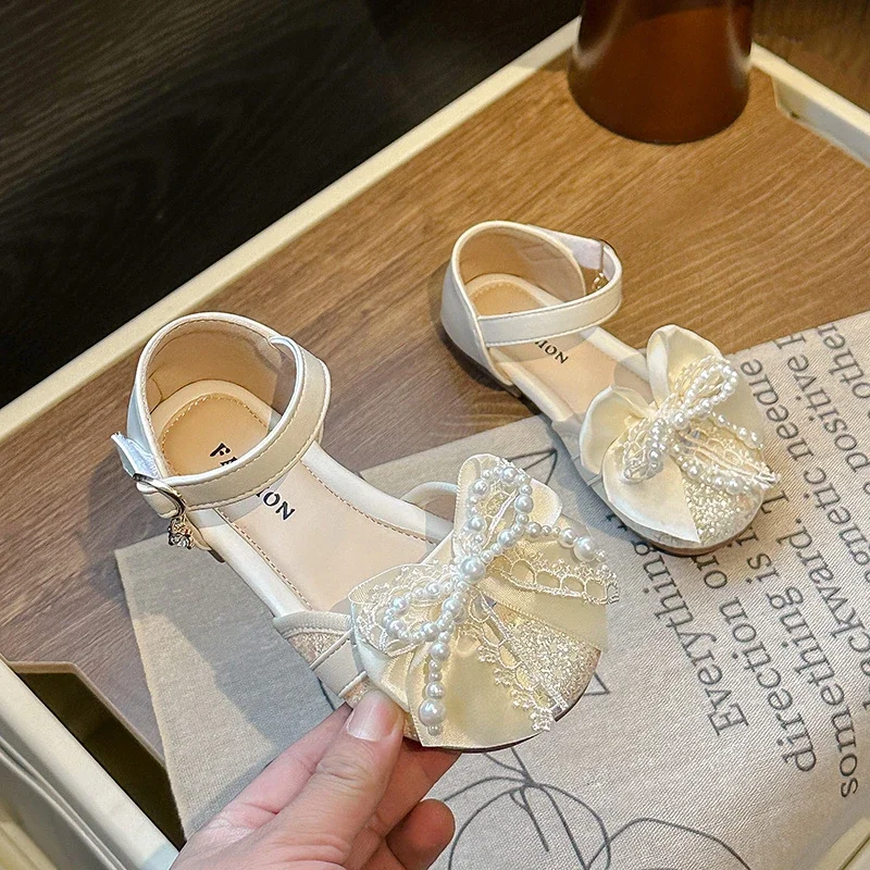 Sandal Musim Panas Anak-anak Sepatu Anak Perempuan Putri Serbaguna Catwalk Balita Sandal Datar Gaun Modis Anak Ikatan Simpul Manik-manik Musim Panas