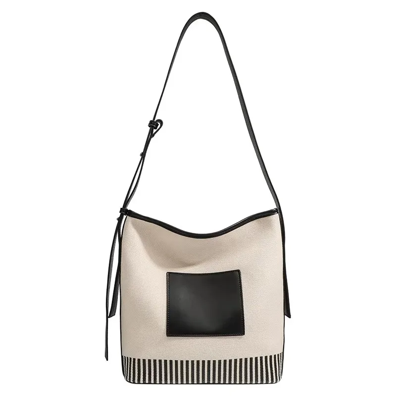 

Women's Fashionable Summer 2025 New Large Capacity High-end Canva Spliced Lightweight Commuting Single Shoulder Bucket Bag