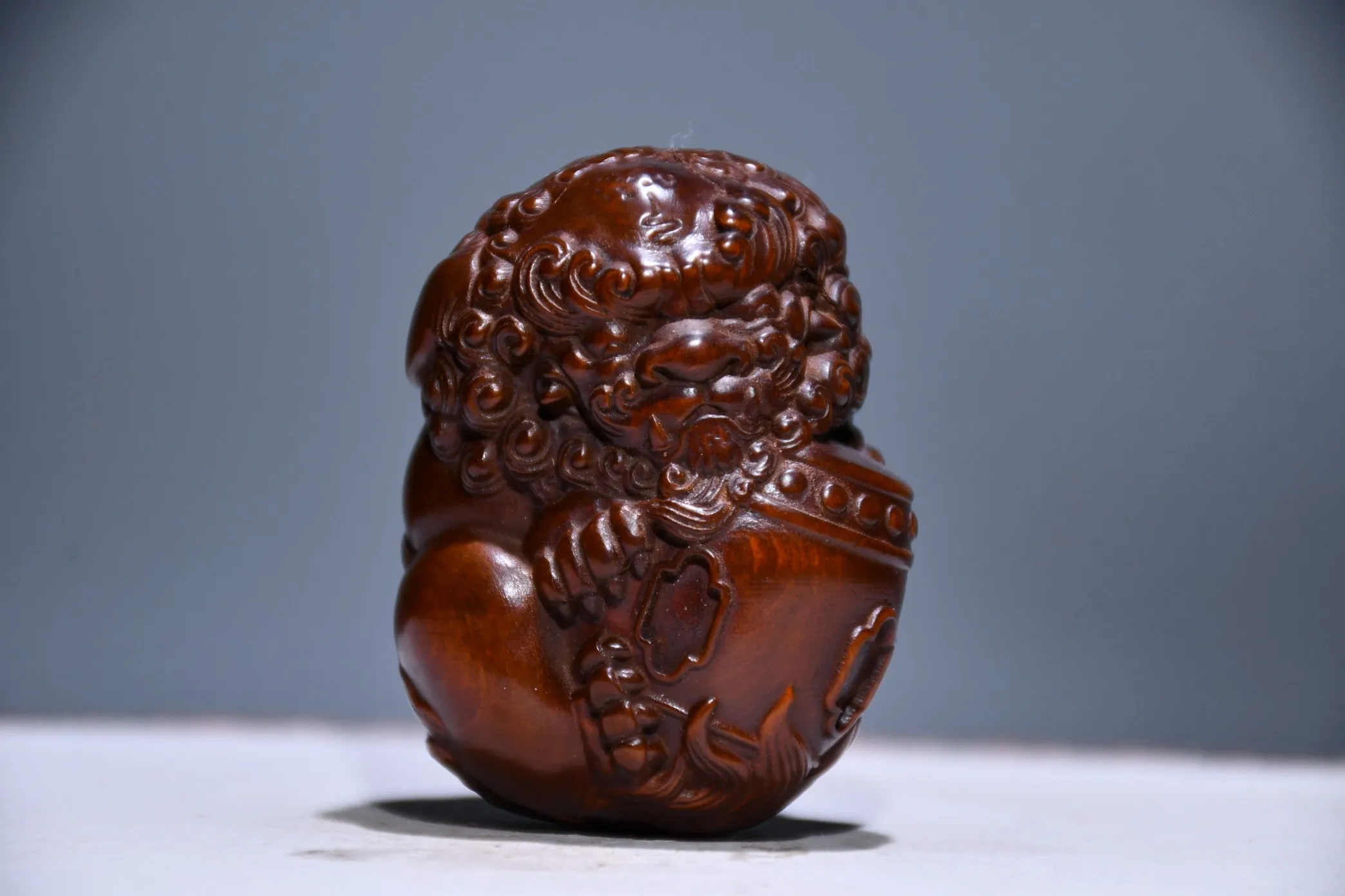 Chinese natural boxwood seiko carved lion holding ball desk decoration home furnishings