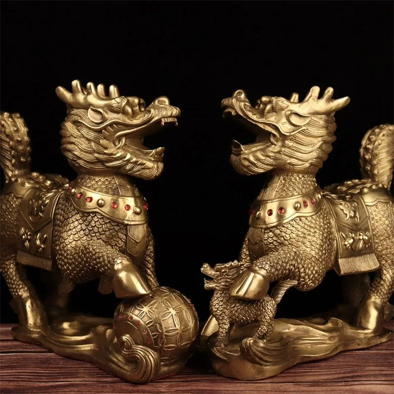 A pair of brass ornaments: stepping on a ball, mother and son , Kirin playing with pearls, suitable for office