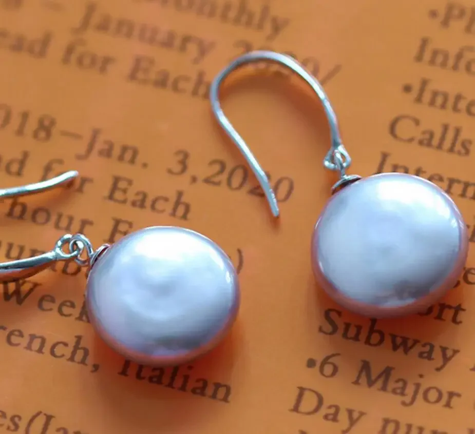 

Baroque freshwater are button shaped natural pearl earrings