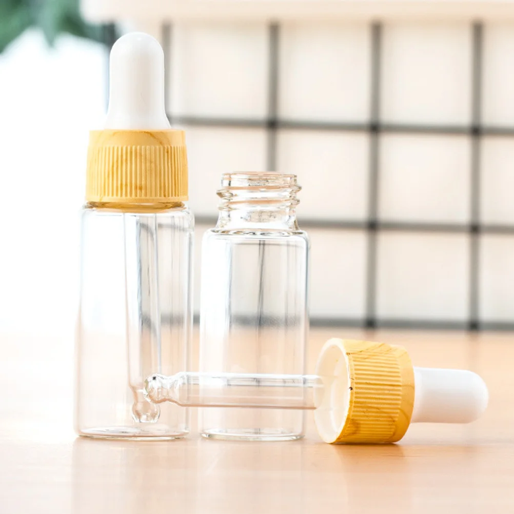 Dispenser contagocce in vetro trasparente con venature del legno da 4 pezzi Bottiglia da 5 ml per toner di olio essenziale Conservazione di bellezza fai-da-te