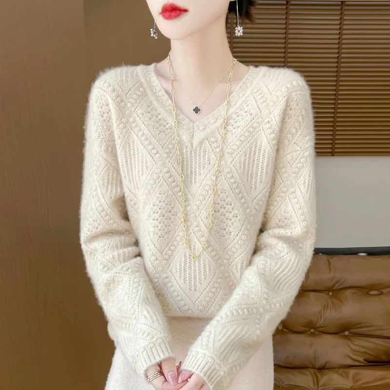 New women\'s V-neck cashmere sweater in autumn and winter Korean version of loose hollow 100% pure wool sweater bottoming shirt.