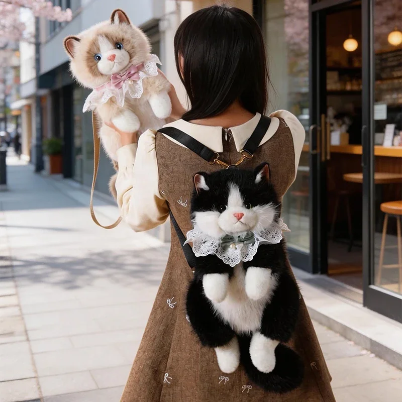 可愛いリアルな猫型バックパック、ふわふわで生きているようなぬいぐるみ猫ショルダーバッグ、レースのリボンとジッパーポケット付き、ラグドール猫プラッシュバッグ