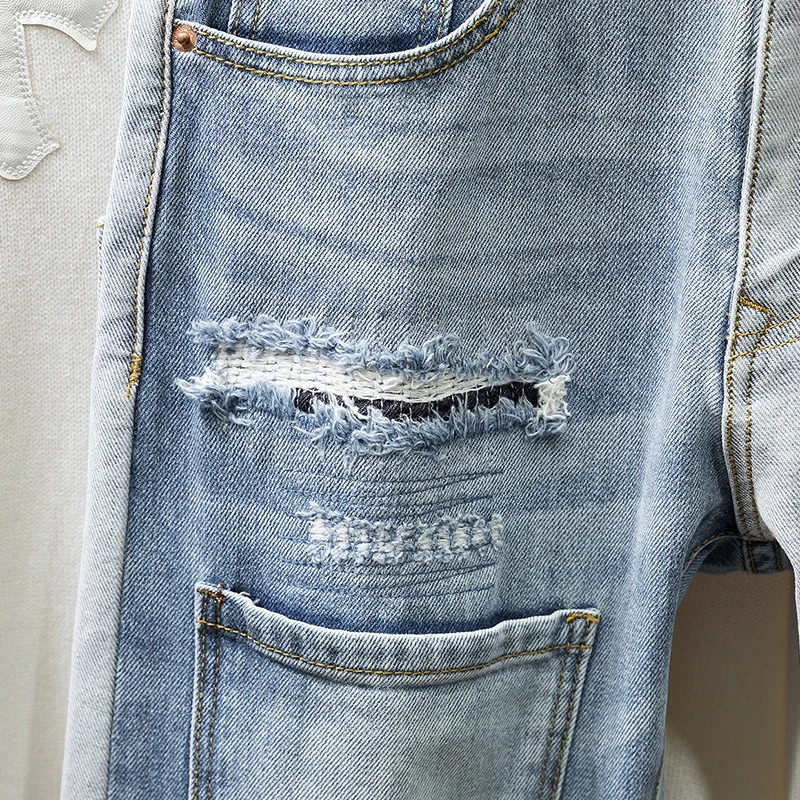 Pantalones vaqueros ajustados de moda coreana para hombre, pantalones de Hip-hop con empalme de bolsillo azul claro, ropa de calle personalizada, pantalones vaqueros elásticos