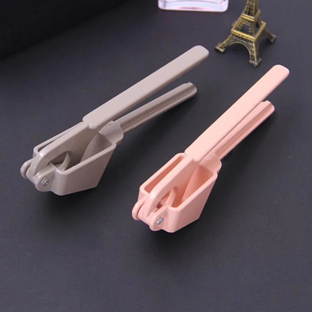 

Garlic Press Rocker Multi-functional Manual Presser Kitchen Slicer Stainless Steel