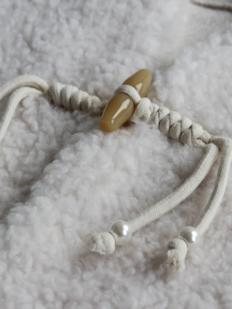 سترة من فراء الضأن المستوردة لعام 2025 سترة قصيرة من الصوف المركب وفتحة رقبة على شكل حرف V