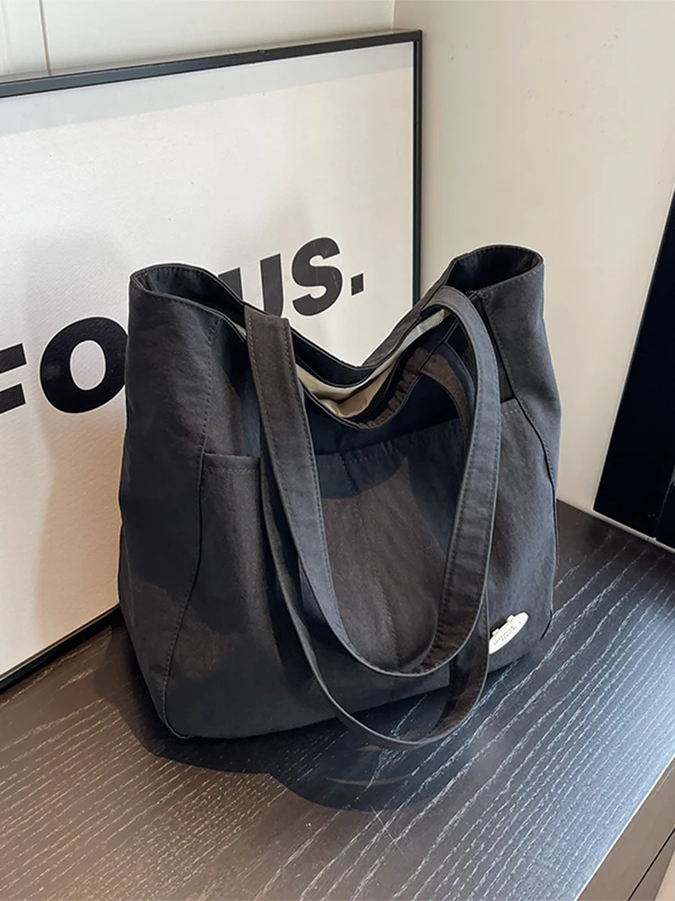 

Casual Canvas Tote Bag Women's Large Capacity Shoulder Bag Commuter Bag for College Students Class New 2026 Style