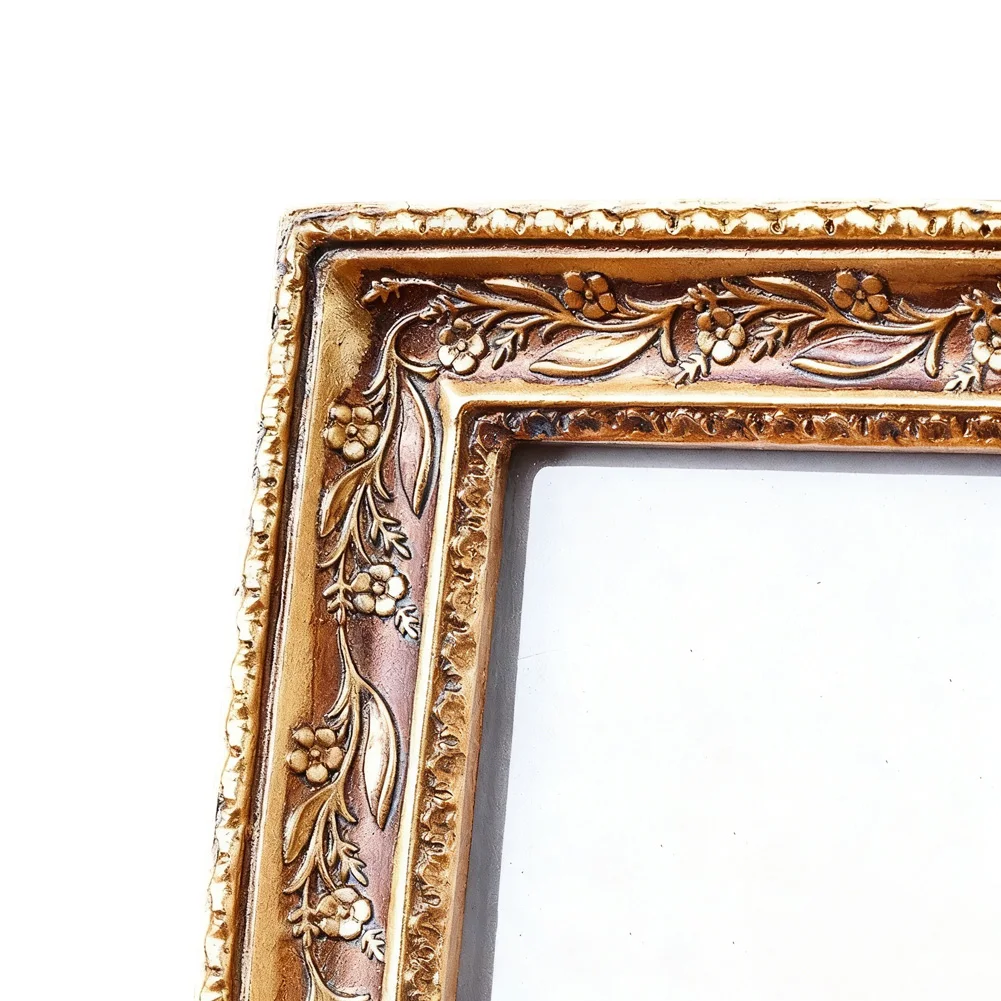 Decorative vintage resin photo frame for 6 inch photographs crafted to add refinement to photo displays in various settings