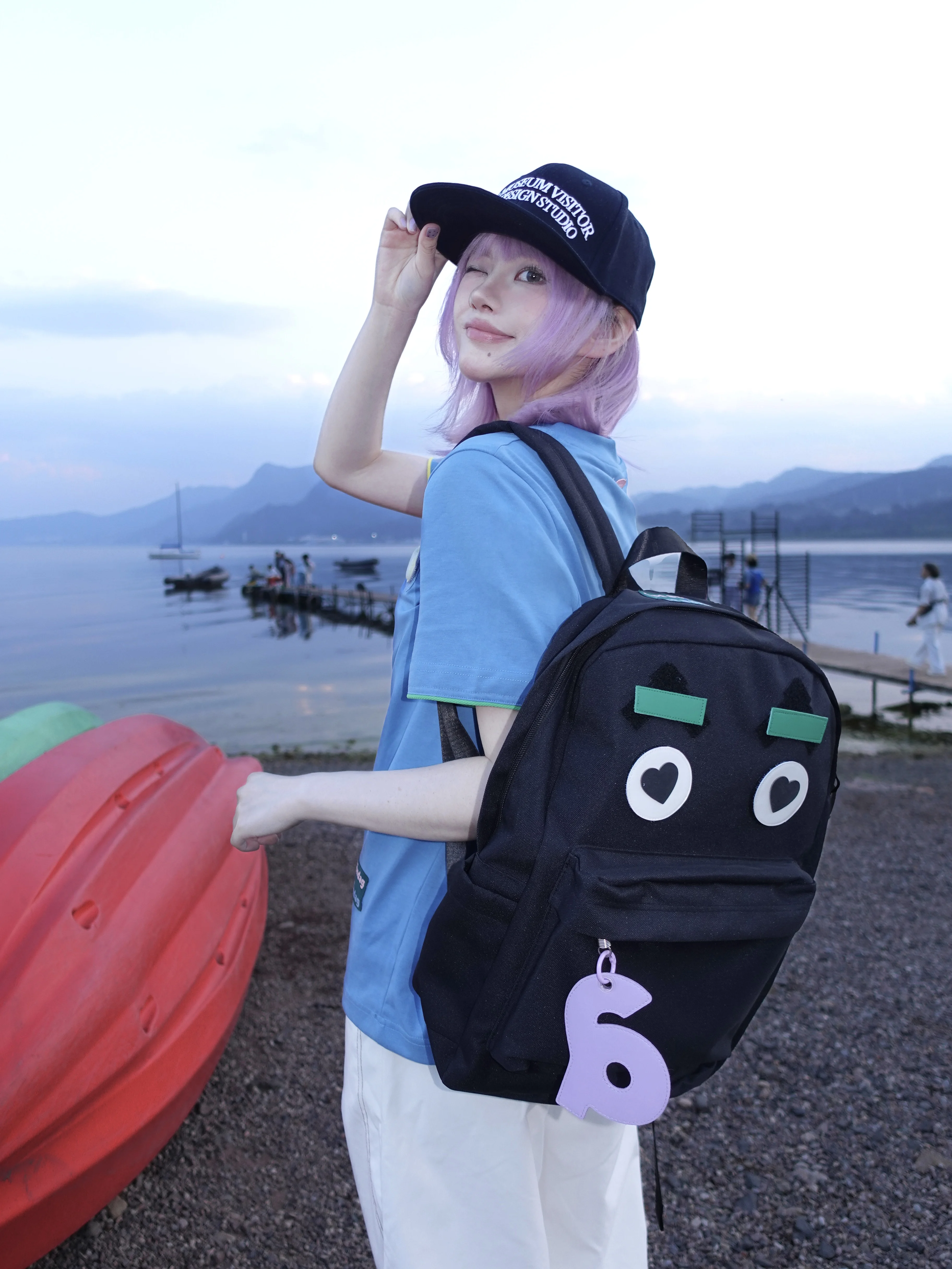 mochila-de-viaje-para-parejas-con-expresion-de-ojos-adorables-material-de-nailon-juvenil-correas-dobles-cierre-de-cremalle