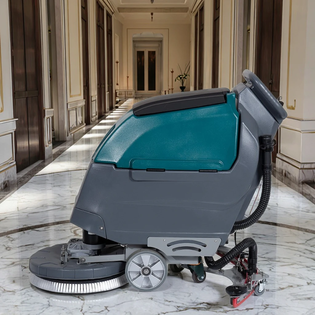 Hotel and factory floor scrubbers automatically walk behind to save time and manpower during cleaning