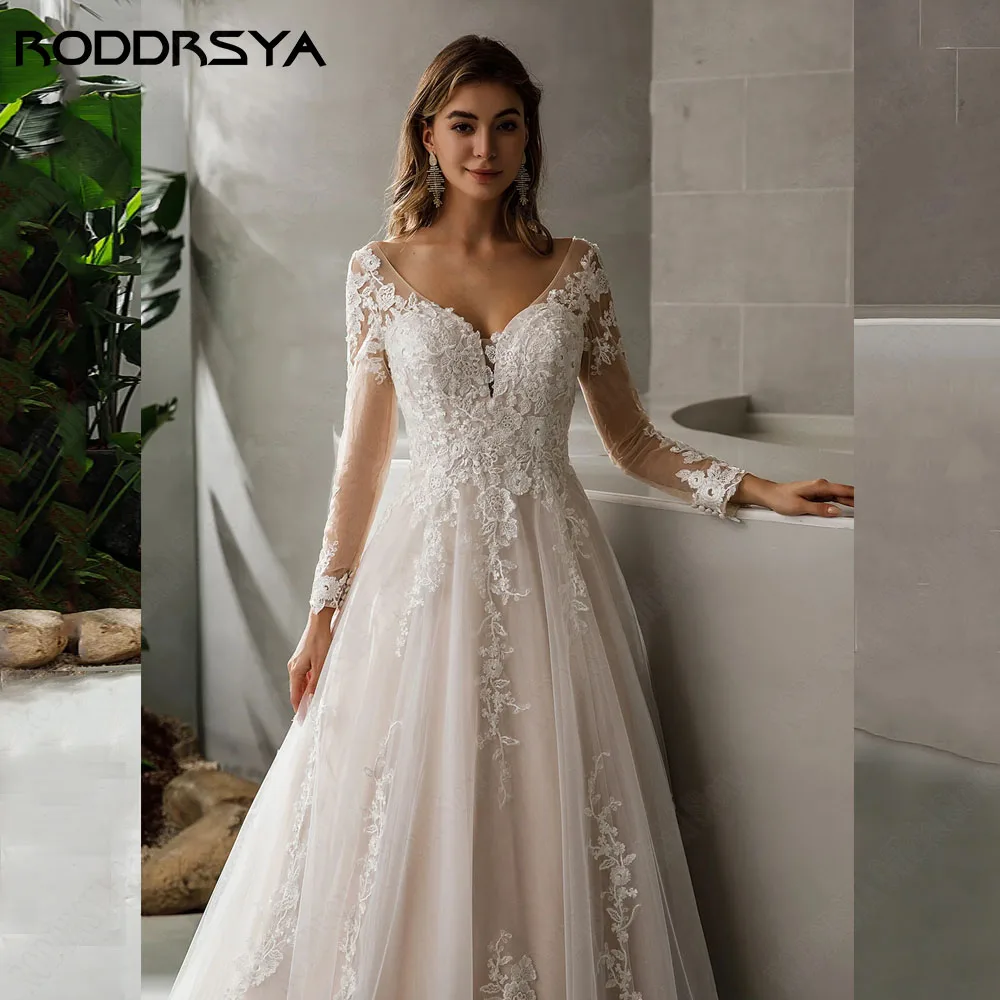 RODRSYA Romântico Renda Vestido de Noiva Backless Applique Vestidos de NRODDRSYA Romântico Lace Vestido De Noiva Backless Applique Vestidos De Noiva Manga Comprida V Neck See-through A Line Sweep Train Vestido De Noiva