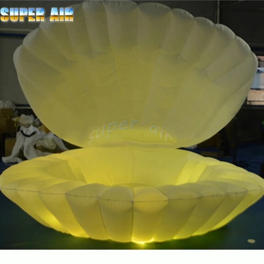 Free blower beautiful giantwithe inflatable shell with colorful led light for stage decoration