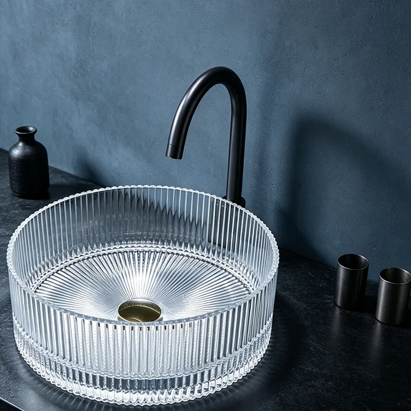 Transparent Glass Countertop Basin, with a Simple and Elegant Round Shape, Allowing Light to Penetrate and Reflect Dynamic Shadows, Creating a Rich Atmosphere. the Three-Dimensional Straight-Line Design Enhances the Layering of Light and Shadow, Making It an Ideal Choice for Modern Bathroom Fixtures, Suitable for Dressing Rooms, Vanity Tables, and Home Bathroom Sinks, and Can Be Matched with Various Decor Styles (Accessories Not Included)