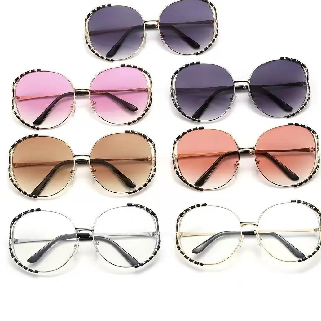 2026 new European and American metal round frame men's and women's fashion street shot concave sunshade sunglasses