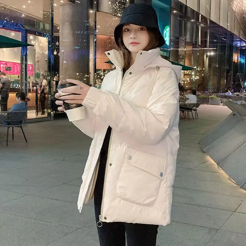 2025年 ロングダウンコットンジャケット レディース 韓国風 ルーズ パファーコート 新作 厚手 暖かい 中綿入り パーカー フード付き マント ファム ヒヴェール