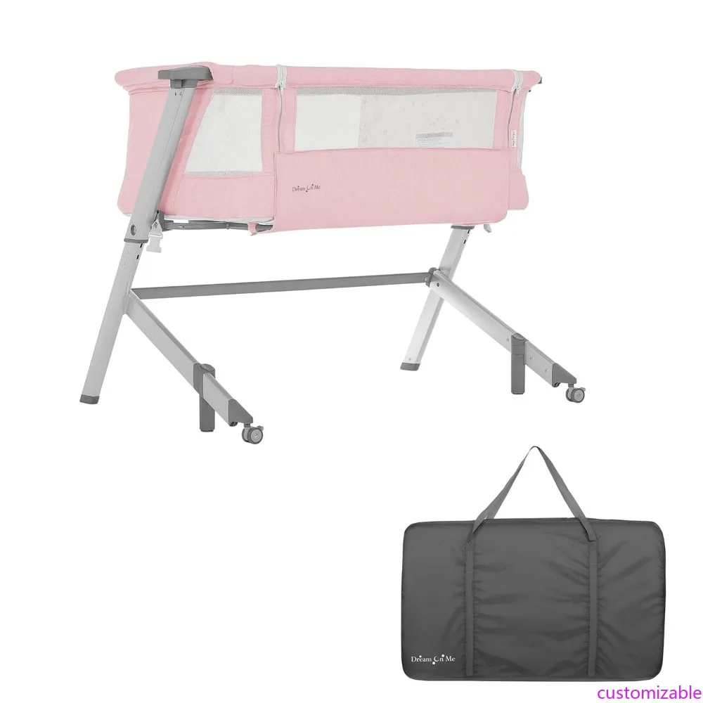 Skylar Bassinet and Beside Sleeper in Pink, Lightweight and Portable Baby Bassinet, Five Position Adjustable Height, Easy to Fo