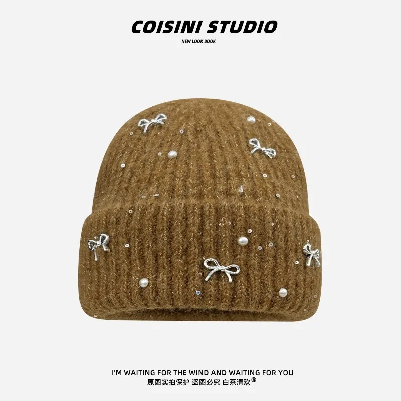 Koreanische Schleifenkappe mit Perlen für Damen, Herbst und Winter, einfache, warme, große Ohrenschutz-Strickmütze. – Detail 2