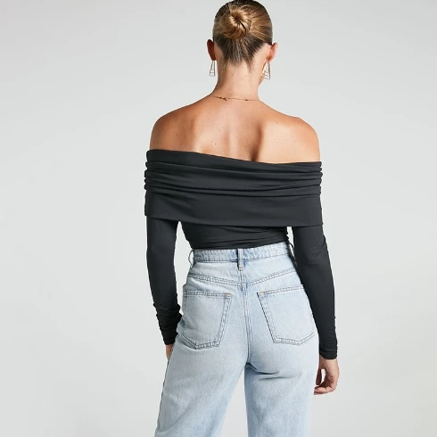 Nuevo mono de mujer a la moda nuevo mono de manga larga sin tirantes doble ciudad plegable con un cuello y hombros descubiertos