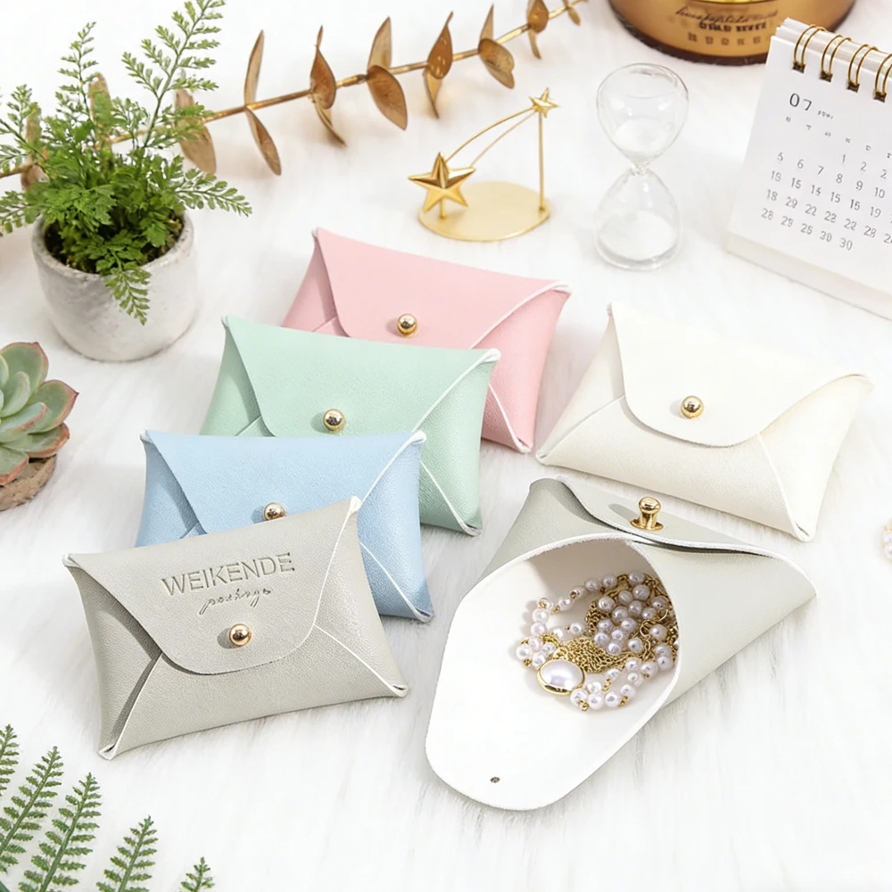 

50/100 шт., серая сумка для ювелирных изделий из искусственной кожи с логотипом, 7x5 см, кольца, серьги, ожерелья, сумки на пуговицах, коробки, органайзер для хранения, подарочная сумка