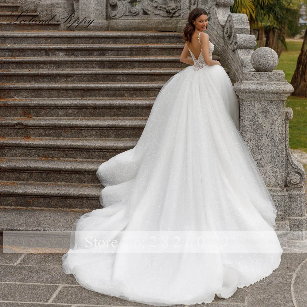 Lceland Poppy Customized Ball Gown Backless Tulle Wedding Dresses Beaded Spaghetti Straps Lace Bridal Gowns with Chapel Train