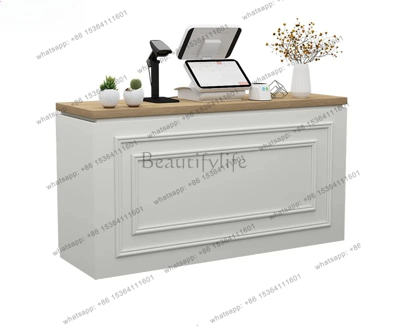 

прилавок магазина одежды, стойка ресепшн, небольшой специализированный магазин, парикмахерская, барный стол