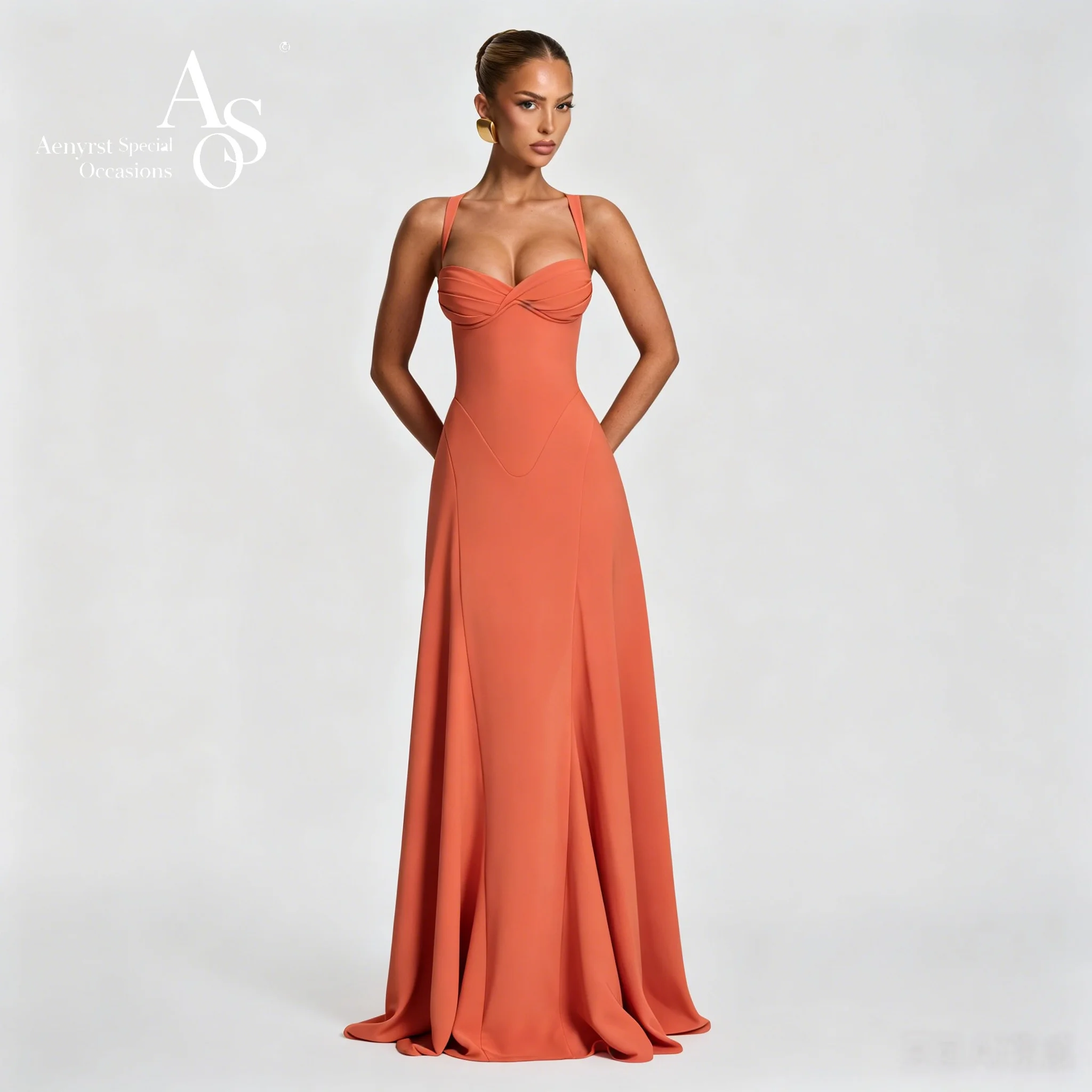 Orange floor-length formal gown featuring a strapless sleeveless bodice draped waist and flowing silhouette perfect for balls